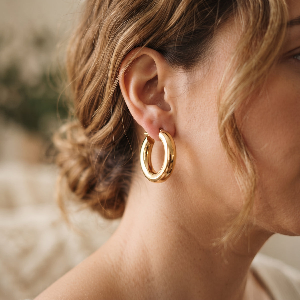 Women's Chunky Gold-Tone Hoop Earrings lifestyle photo